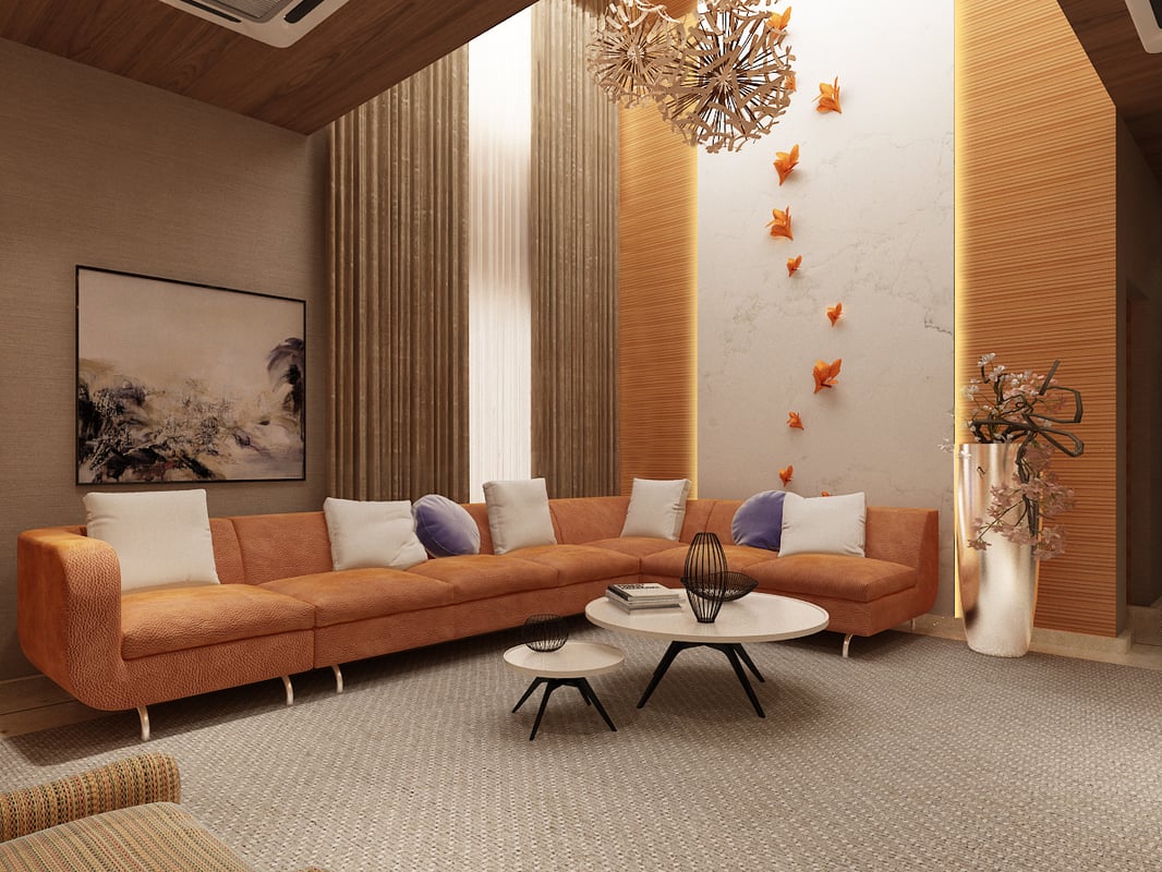 Living room featuring a curved terracotta sectional, paired nesting tables and floral wall art, Hyderabad home interiors