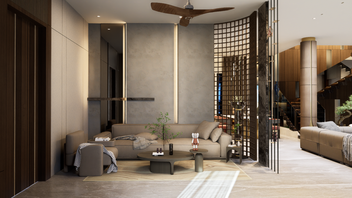 Calm contemporary living room in Hyderabad with low taupe sofas, stone walls, lattice screen and round coffee tables